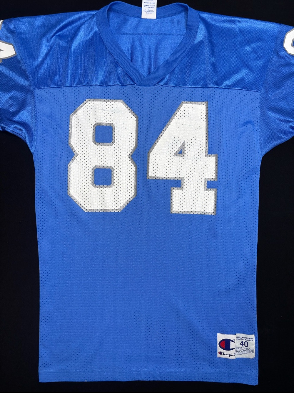 Vintage Detroit Lions Herman Moore #84 football jersey by Champion. Size 40 (M)